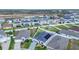 A neighborhood of homes with solar panels and fenced yards offer energy efficiency and privacy at 9158 Elsa Ct, Davenport, FL 33897