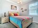 Cozy bedroom featuring a charming color palette, complementing the art and decor at 9158 Elsa Ct, Davenport, FL 33897