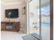 Living area showcasing a sliding door view of the pool and patio, offering indoor-outdoor living at 9158 Elsa Ct, Davenport, FL 33897