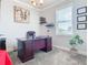 Professional office space featuring a large desk, sophisticated decor, and ample natural light at 9158 Elsa Ct, Davenport, FL 33897