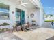 Charming outdoor patio featuring comfortable seating, perfect for entertaining guests at 9158 Elsa Ct, Davenport, FL 33897