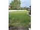 Spacious backyard with well-maintained lawn and privacy fence at 1217 Honey Blossom Dr, Orlando, FL 32824