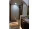 Bathroom with glass shower stall and decorative vanity at 1217 Honey Blossom Dr, Orlando, FL 32824
