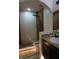 Bathroom with glass shower stall and decorative vanity at 1217 Honey Blossom Dr, Orlando, FL 32824