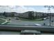 Street with townhomes at 1217 Honey Blossom Dr, Orlando, FL 32824
