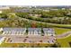 Aerial view showing townhomes, parking and the surrounding area at 10287 Ebb Tide Lane, Orlando, FL 32821