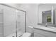 Modern bathroom featuring a glass-enclosed shower and stylish vanity at 10287 Ebb Tide Lane, Orlando, FL 32821