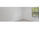 Bright bedroom with neutral walls and a window with blinds at 10287 Ebb Tide Lane, Orlando, FL 32821