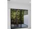 Private balcony with glass sliding door and outdoor views at 10287 Ebb Tide Lane, Orlando, FL 32821