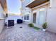 Private patio with stone pavers, ideal for outdoor entertaining and relaxing at 10394 Spring Arbor Ln, Winter Garden, FL 34787