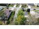 A neighborhood features single-Gathering homes with lush landscaping and backyard pools, creating a serene environment at 129 Pine Lake View Dr, Davenport, FL 33837