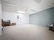 An expansive unfinished basement space with a fresh coat of paint, ready to be transformed into a custom area at 129 Pine Lake View Dr, Davenport, FL 33837