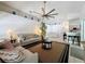 Bright living room features contemporary furnishings, stylish decor, and an open floor plan at 129 Pine Lake View Dr, Davenport, FL 33837