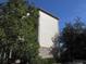 Exterior of the building with beautiful accents and landscaping at 1361 Tuscan Ter # 7406, Davenport, FL 33896