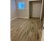 Bedroom featuring tile floors and a closet with wire shelving at 145 Scottsdale Sq # 145, Winter Park, FL 32792