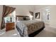 Comfortable main bedroom features plush bedding and carpeted flooring at 16014 Hawk Hill St, Clermont, FL 34714
