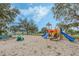 Neighborhood playground featuring a variety of play equipment including slides, swings, and climbing structures at 16014 Hawk Hill St, Clermont, FL 34714