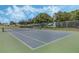 Enjoy a match on this well-maintained community tennis court with net and fencing at 16014 Hawk Hill St, Clermont, FL 34714