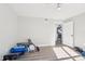 Home exercise room with wood floor and minimal exercise equipment at 16035 Wilkinson Dr, Clermont, FL 34714