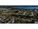 A beautiful aerial view captures the neighborhood's layout, showcasing its proximity to the serene lake at 1756 Elbert Acres Ne Ct, Winter Haven, FL 33881