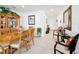 Comfortable dining room and furniture looking to the entryway and living room at 202 Zircon Rd, Kissimmee, FL 34758