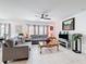 Inviting living room featuring comfortable seating and a large window with natural light at 202 Zircon Rd, Kissimmee, FL 34758