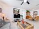 Comfortable living room with a modern decor, looking to the dining area at 202 Zircon Rd, Kissimmee, FL 34758