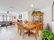 Open-concept living and dining area with tile flooring and modern decor at 202 Zircon Rd, Kissimmee, FL 34758