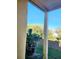 Balcony with a view of lush greenery and palm trees at 2047 Dixie Belle Dr # 2047 T, Orlando, FL 32812