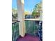 Balcony with view of landscaped green space and blue sky at 2047 Dixie Belle Dr # 2047 T, Orlando, FL 32812