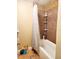 Bathroom with colorful mosaic tile, a tub with a shower curtain, and toiletries at 2047 Dixie Belle Dr # 2047 T, Orlando, FL 32812