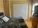 Comfortable bedroom with large closet and hardwood floors at 2047 Dixie Belle Dr # 2047 T, Orlando, FL 32812