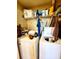 Laundry room with washer, dryer, and overhead shelving for storage at 2047 Dixie Belle Dr # 2047 T, Orlando, FL 32812