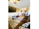 Spacious living room with comfortable couch and large rug at 2047 Dixie Belle Dr # 2047 T, Orlando, FL 32812