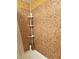 Shower stall with mosaic tile walls and corner shelving at 2047 Dixie Belle Dr # 2047 T, Orlando, FL 32812