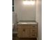 Bathroom vanity featuring granite countertop, modern fixtures and new cabinetry at 2086 Blackfoot Trl, St Cloud, FL 34771