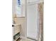 Bathroom featuring white subway tile, a vanity, and neutral color scheme at 2086 Blackfoot Trl, St Cloud, FL 34771