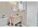 Bathroom featuring a vanity, subway tile, and neutral color scheme at 2086 Blackfoot Trl, St Cloud, FL 34771