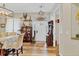 Welcoming foyer with hardwood floors, decorative shelving, and stylish furnishings at 2086 Blackfoot Trl, St Cloud, FL 34771