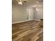 Open living area featuring stylish flooring and glass doors leading to the backyard at 2086 Blackfoot Trl, St Cloud, FL 34771