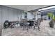 Outdoor patio with pavers and outdoor dining area at 2086 Blackfoot Trl, St Cloud, FL 34771
