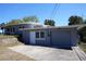 Charming single-story home features a garage, driveway, and well-maintained landscaping at 2326 S Peninsula Dr, Daytona Beach, FL 32118