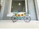 Cute welcome bicycle decoration on the front porch of this inviting home at 2326 S Peninsula Dr, Daytona Beach, FL 32118