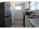 Bright kitchen with stainless steel refrigerator and an undermount sink at 2326 S Peninsula Dr, Daytona Beach, FL 32118