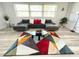 Comfortable living room area with large windows and stylish decor at 2326 S Peninsula Dr, Daytona Beach, FL 32118