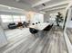 Bright open concept living space with ample seating, neutral tones, and lots of natural light at 2326 S Peninsula Dr, Daytona Beach, FL 32118