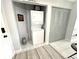 Conveniently located in-unit laundry closet with stacked washer and dryer at 2560 Woodgate Blvd # 203, Orlando, FL 32822
