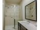 Contemporary bathroom with a glass-enclosed shower and sleek vanity at 2652 Corvette Ln, Kissimmee, FL 34746