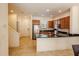 Well-equipped kitchen with stainless steel appliances, granite countertops, and a breakfast bar at 2652 Corvette Ln, Kissimmee, FL 34746