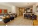Spacious living area combining a cozy living room with dining area and a modern kitchen at 2652 Corvette Ln, Kissimmee, FL 34746